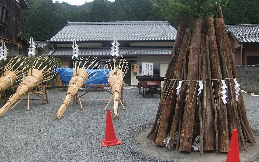 Giant pine torches stacked in Kurama before the fire festival