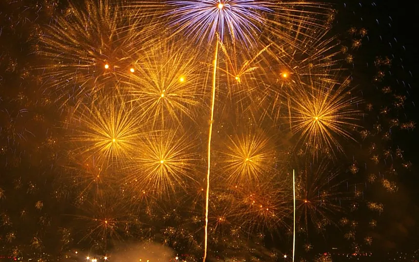 Gold and blue shells above the city lights at the Naniwa Yodogawa Fireworks, August 2008